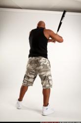 Man Adult Athletic Black Standing poses Casual Fighting with bat